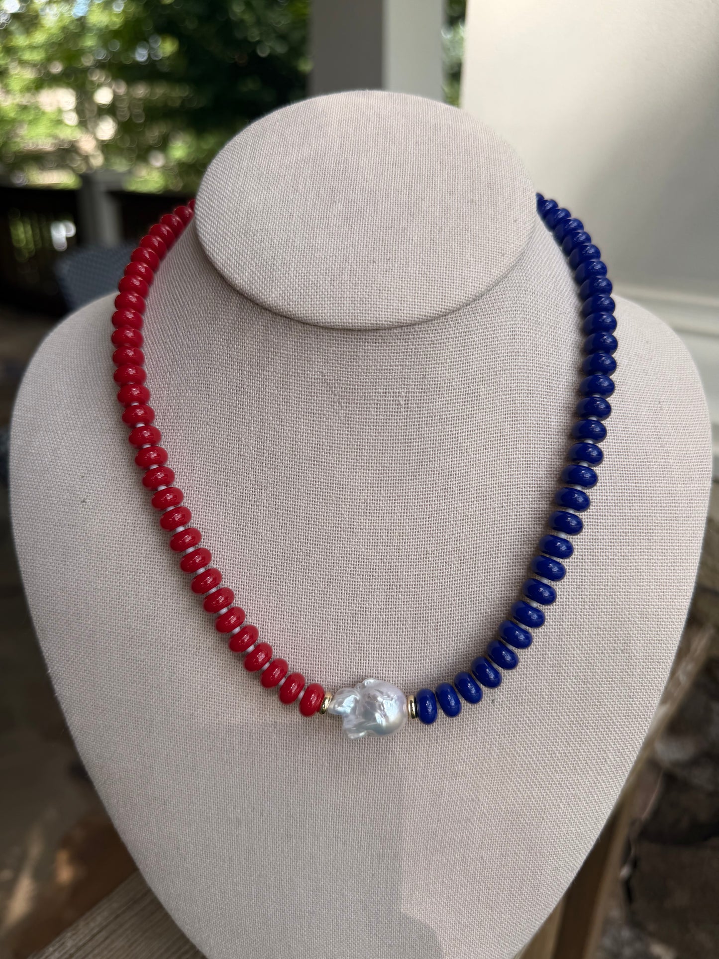 American: red and blue with a baroque pearl