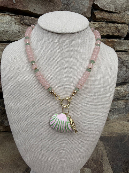 Beachy: pink and green, with a matching hand painted shell and fish charm