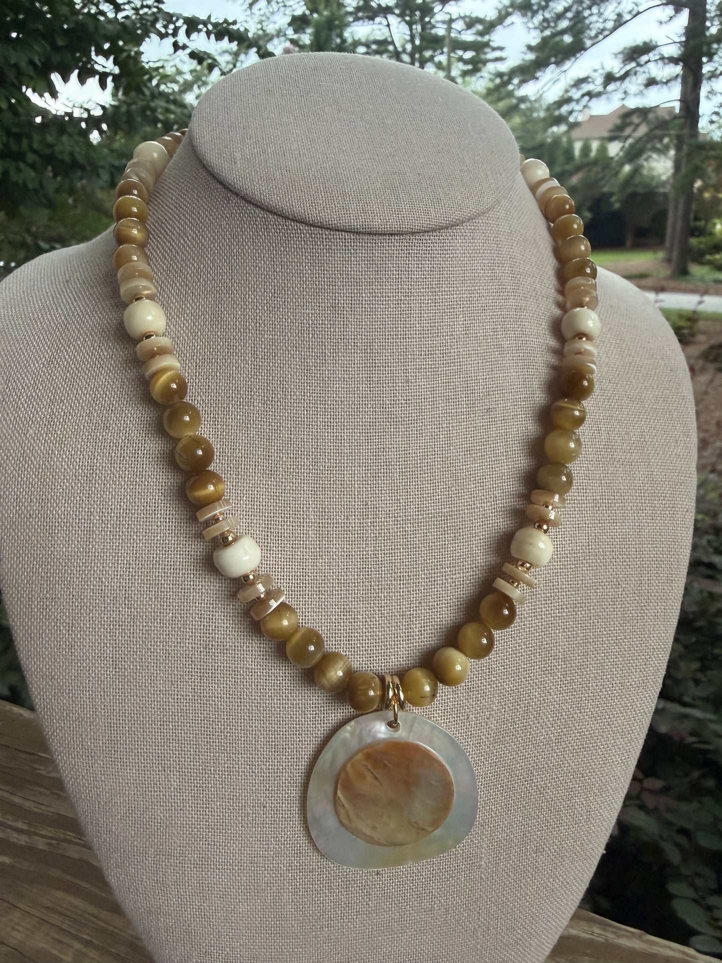 Beachy: Carmel colored beads with shell pendant