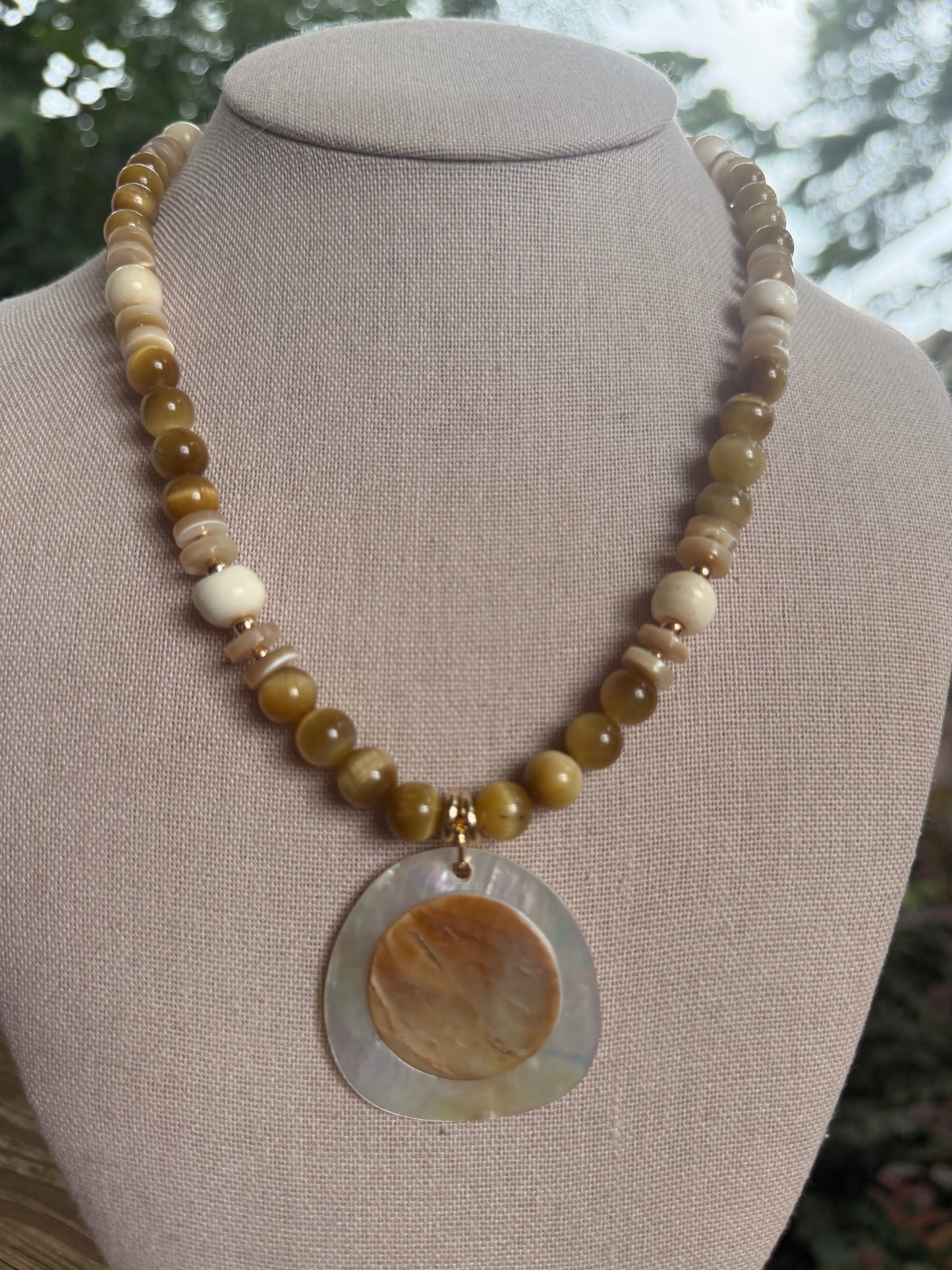 Beachy: Carmel colored beads with shell pendant